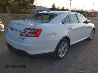 2015 Ford Taurus SEL with VIN 1FAHP2E82FG202143, listed as a IAAI auction lot 42053737 with 113,839 mi miles and . Bid and sale history available at carsss.com. Image 4.