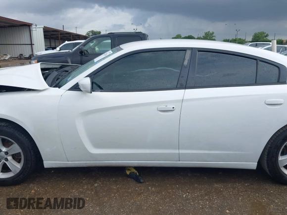 2013 Dodge Charger SE z VIN 2C3CDXBG0DH531483, wystawiony jako IAAI lot #42131266 z przebiegiem Nie podano mil oraz . Historia ofert i sprzedaży dostępna na DreamBid. Obrazek 14.