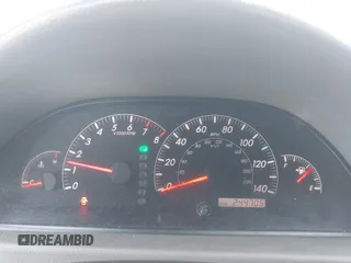 2005 Toyota Camry STD z VIN 4T1BE32K45U399095, wystawiony jako IAAI lot #41609211 z przebiegiem 244 705 mil mil oraz . Historia ofert i sprzedaży dostępna na DreamBid. Obrazek 7.