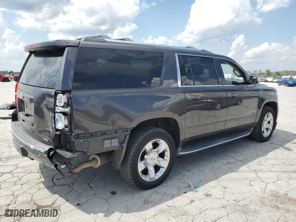 2015 Chevrolet Suburban LTZ with VIN 1GNSCKKCXFR216890, listed as a Copart auction lot 52695155 with 233,296 mi miles and Clean Title. Bid and sale history available at carsss.com. Image 3.