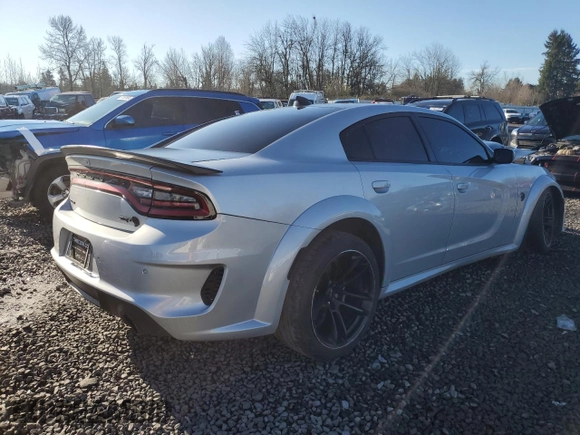 2022 Dodge Charger SRT Hellcat Widebody z VIN 2C3CDXL98NH159571, wystawiony jako Copart lot #87457204 z przebiegiem 15 828 mil mil oraz Szkoda całkowita • Salvage title. Historia ofert i sprzedaży dostępna na DreamBid. Obrazek 3.