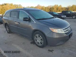 2011 Honda Odyssey EX-L with VIN 5FNRL5H64BB007901, listed as a Copart auction lot 73326864 with 149,699 mi miles and Clean Title. Bid and sale history available at DreamBid. Image 4.