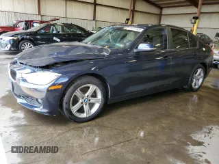 2014 BMW 3 Series 320i with VIN WBA3B1G5XENT00747, listed as a Copart auction lot 64737935 with 123,374 mi miles and Salvage title. Bid and sale history available at DreamBid. Image 1.