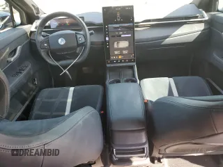 2023 Fisker Ocean One z VIN VCF1ZBU29PG004499, wystawiony jako Copart lot #55474415 z przebiegiem 14 190 mil mil oraz Szkoda całkowita • Salvage title. Historia ofert i sprzedaży dostępna na DreamBid. Obrazek 8.