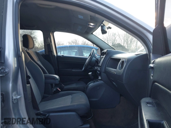 2016 Jeep Compass Sport with VIN 1C4NJCBA1GD743294, listed as a IAAI auction lot 41035177 with 124,379 mi miles. Bid and sale history available at carsss.com. Image 5.