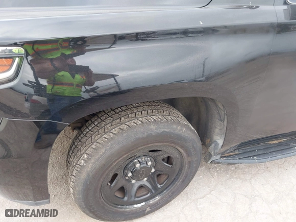 2019 Chevrolet Tahoe Commercial with VIN 1GNLCDECXKR231072, listed as a IAAI auction lot 41800007 with 100,101 mi miles. Bid and sale history available at carsss.com. Image 17.