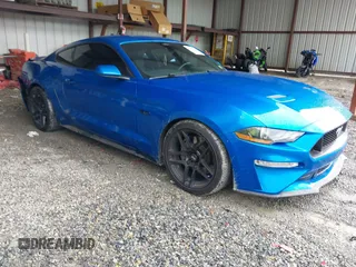 2021 Ford Mustang GT with VIN 1FA6P8CF4M5125666, listed as a IAAI auction lot 42192986 with 63,667 mi miles and . Bid and sale history available at DreamBid. Image 1.