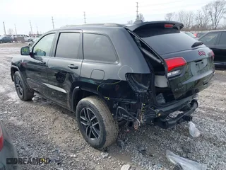 2019 Jeep Grand Cherokee Trailhawk with VIN 1C4RJFLTXKC696820, listed as a IAAI auction lot 41443851 with 50,848 mi miles. Bid and sale history available at carsss.com. Image 3.