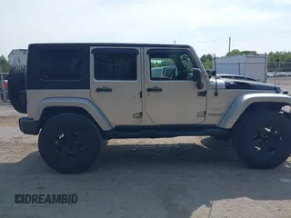 2008 Jeep Wrangler Unlimited Sahara with VIN 1J4GA59158L623784, listed as a IAAI auction lot 40365783 with 185,224 mi miles and . Bid and sale history available at DreamBid. Image 13.