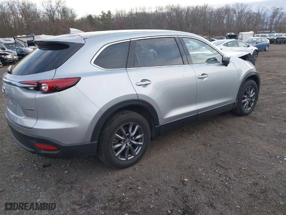 2023 Mazda CX-9 Touring with VIN JM3TCBCY4P0641459, listed as a IAAI auction lot 41011978 with NaN miles. Bid and sale history available at carsss.com. Image 4.
