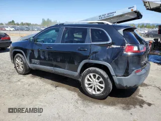2019 Jeep Cherokee Latitude with VIN 1C4PJMCB0KD124765, listed as a Copart auction lot 59771225 with 147,815 mi miles and Salvage title. Bid and sale history available at DreamBid. Image 2.