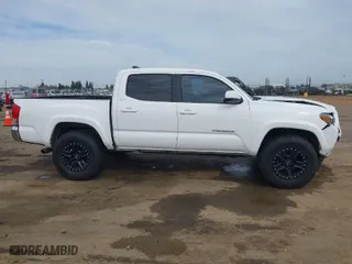 2017 Toyota Tacoma SR5 with VIN 3TMAZ5CN9HM040584, listed as a IAAI auction lot 41642382 with 53,571 mi miles. Bid and sale history available at carsss.com. Image 13.