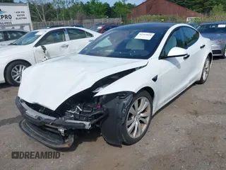 2021 Tesla Model S Long Range with VIN 5YJSA1E57MF428512, listed as a IAAI auction lot 42511020 with 29,611 mi miles and . Bid and sale history available at DreamBid. Image 20.