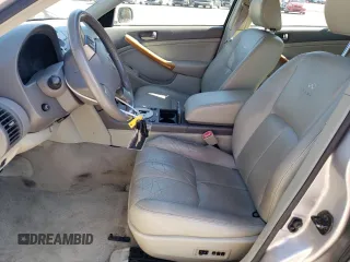 2003 Infiniti G35 w/Leather z VIN JNKCV51E63M321042, wystawiony jako Copart lot #57238535 z przebiegiem 157 847 mil mil oraz Czysty tytuł • Clean title. Historia ofert i sprzedaży dostępna na DreamBid. Obrazek 7.