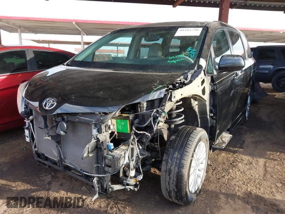 2012 Toyota Sienna XLE AAS with VIN 5TDYK3DC6CS263128, listed as a IAAI auction lot 41583798 with 114,820 mi miles. Bid and sale history available at carsss.com. Image 18.
