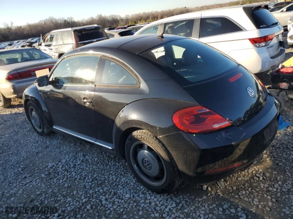 2012 Volkswagen Beetle 2.5L w/Sun/Sound/Nav PZEV with VIN 3VWJP7AT0CM645263, listed as a Copart auction lot 42690475 with 166,549 mi miles and Salvage Title. Bid and sale history available at carsss.com. Image 2.