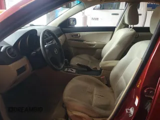 2008 Mazda 3 i Touring with VIN JM1BK32GX81157989, listed as a IAAI auction lot 42246663 with 140,150 mi miles and . Bid and sale history available at DreamBid. Image 1.