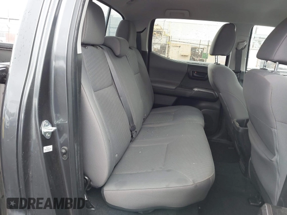 2022 Toyota Tacoma SR5 with VIN 3TMBZ5DN2NM034561, listed as a IAAI auction lot 40867443 with 51,728 mi miles and . Bid and sale history available at DreamBid. Image 8.