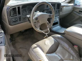 2003 GMC Sierra Denali z VIN 2GTFK69U531406006, wystawiony jako Copart lot #89369145 z przebiegiem Nie podano mil oraz Tytuł czysty. Historia ofert i sprzedaży dostępna na DreamBid. Obrazek 8.