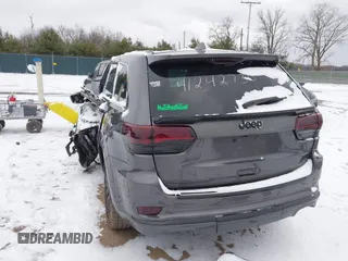 2016 Jeep Grand Cherokee High Altitude with VIN 1C4RJFCGXGC417764, listed as a IAAI auction lot 41242730 with 124,139 mi miles. Bid and sale history available at carsss.com. Image 3.