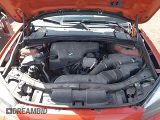 2015 BMW X1 xDrive28i with VIN WBAVL1C57FVY27822, listed as a IAAI auction lot 41977545 with 76,211 mi miles. Bid and sale history available at carsss.com. Image 10.