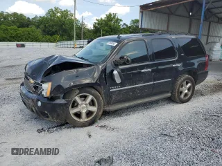 2010 Chevrolet Tahoe LTZ with VIN 1GNUCCE06AR189230, listed as a Copart auction lot 61899365 with 215,727 mi miles and Salvage title. Bid and sale history available at DreamBid. Image 1.