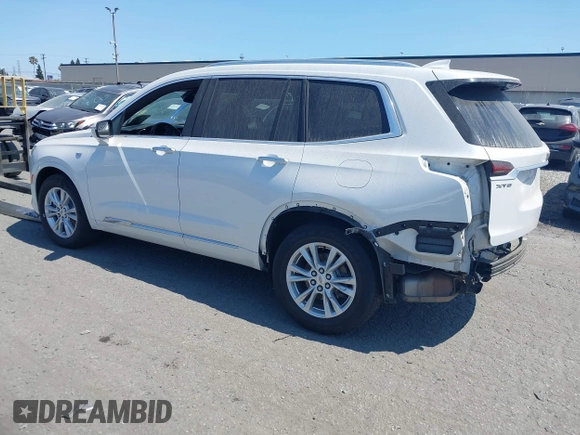 2021 Cadillac XT6 Luxury with VIN 1GYKPAR47MZ221123, listed as a IAAI auction lot 42374772 with 69,829 mi miles and . Bid and sale history available at DreamBid. Image 3.