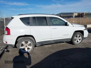 2014 Jeep Compass Latitude with VIN 1C4NJCEB0ED660019, listed as a IAAI auction lot 41200065 with 185,174 mi miles. Bid and sale history available at carsss.com. Image 13.