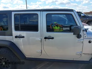 2008 Jeep Wrangler Unlimited Rubicon with VIN 1J4GA69178L550598, listed as a IAAI auction lot 42232887 with 99,637 mi miles and . Bid and sale history available at carsss.com. Image 13.