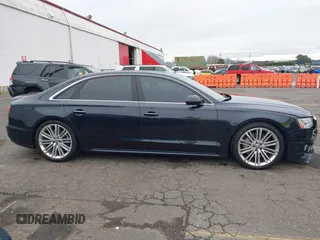 2017 Audi A8 L Sport with VIN WAU43AFD1HN007334, listed as a IAAI auction lot 41760035 with 67,342 mi miles. Bid and sale history available at carsss.com. Image 13.