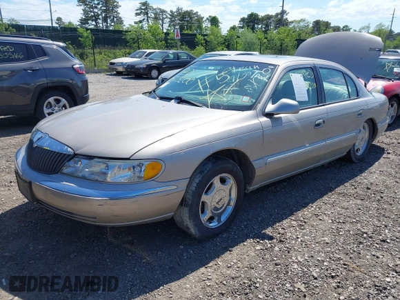 2001 Lincoln Continental z VIN 1LNHM97V31Y638576, wystawiony jako IAAI lot #42305531 z przebiegiem Nie podano mil oraz . Historia ofert i sprzedaży dostępna na DreamBid. Obrazek 2.