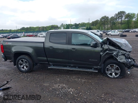 2018 Chevrolet Colorado 4WD Z71 with VIN 1GCGTDEN3J1184203, listed as a IAAI auction lot 42250291 with 72,972 mi miles and . Bid and sale history available at DreamBid. Image 12.