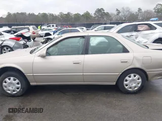 1997 Toyota Camry LE z VIN 4T1BG22K9VU786181, wystawiony jako IAAI lot #41610928 z przebiegiem 338 829 mil mil oraz . Historia ofert i sprzedaży dostępna na DreamBid. Obrazek 14.