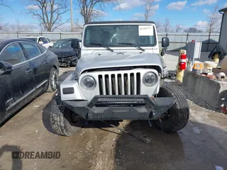 2005 Jeep Wrangler Unlimited with VIN 1J4FA44S25P340852, listed as a IAAI auction lot 41441671 with 139,302 mi miles. Bid and sale history available at carsss.com. Image 12.