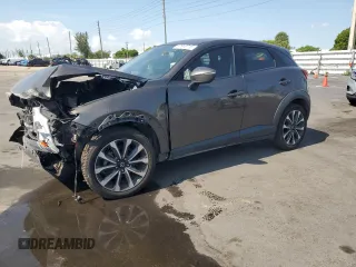 2019 Mazda CX-3 Touring z VIN JM1DKDC73K1406427, wystawiony jako Copart lot #57946715 z przebiegiem 71 838 mil mil oraz Szkody całkowita. Historia ofert i sprzedaży dostępna na DreamBid. Obrazek 1.
