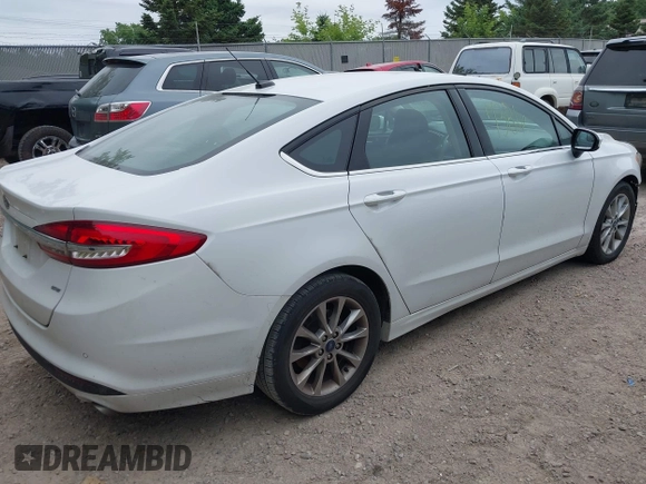 2017 Ford Fusion SE z VIN 3FA6P0H71HR413635, wystawiony jako IAAI lot #42507386 z przebiegiem 165 991 mil mil oraz . Historia ofert i sprzedaży dostępna na DreamBid. Obrazek 4.