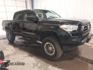 2021 Toyota Tacoma 4WD SR with VIN 3TMCZ5AN2MM391259, listed as a IAAI auction lot 40218923 with 47,058 mi miles. Bid and sale history available at carsss.com. Image 1.