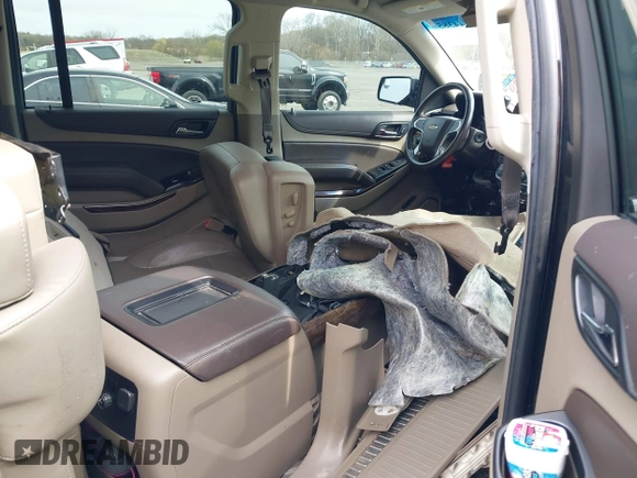 2019 Chevrolet Suburban LT with VIN 1GNSKHKC4KR405843, listed as a IAAI auction lot 41944385 with 123,071 mi miles and . Bid and sale history available at DreamBid. Image 8.