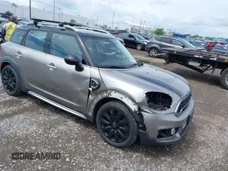 2018 MINI Countryman Cooper S with VIN WMZYT5C35J3D82204, listed as a IAAI auction lot 42836278 with 65,649 mi miles and . Bid and sale history available at DreamBid. Image 1.