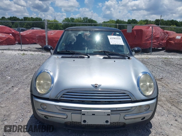 2002 MINI Hardtop with VIN WMWRC33432TE11649, listed as a IAAI auction lot 42583224 with 114,339 mi miles and . Bid and sale history available at DreamBid. Image 6.