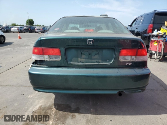 1999 Honda Civic EX with VIN 1HGEJ8243XL083130, listed as a Copart auction lot 60248885 with 331,458 mi miles and Salvage title. Bid and sale history available at DreamBid. Image 6.