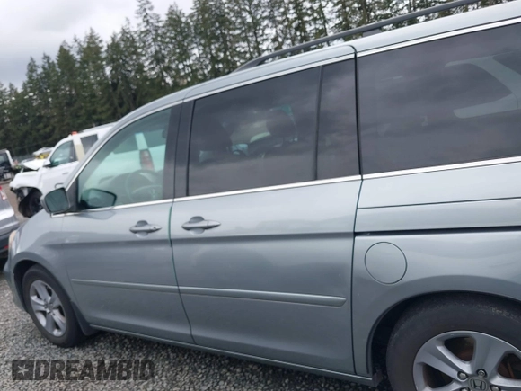 2008 Honda Odyssey Touring with VIN 5FNRL38908B098771, listed as a IAAI auction lot 41878646 with 167,834 mi miles. Bid and sale history available at carsss.com. Image 14.