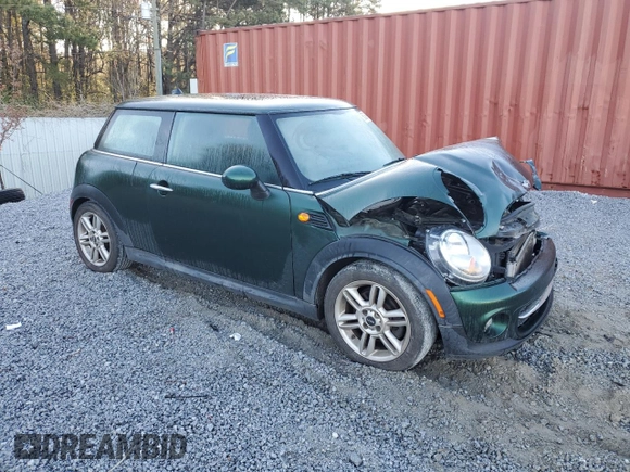 2011 MINI Hardtop with VIN WMWSU3C57BTX97173, listed as a Copart auction lot 50369155 with 122,713 mi miles and Salvage Title. Bid and sale history available at DreamBid. Image 4.