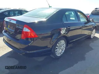 2010 Ford Fusion Hybrid z VIN 3FADP0L39AR396746, wystawiony jako IAAI lot #41764282 z przebiegiem 132 582 mil mil oraz . Historia ofert i sprzedaży dostępna na DreamBid. Obrazek 4.