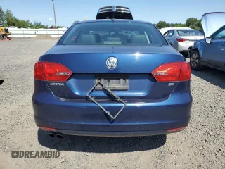 2014 Volkswagen Jetta SE with VIN 3VWD17AJ9EM323625, listed as a Copart auction lot 58211655 with 108,099 mi miles and Salvage title. Bid and sale history available at DreamBid. Image 6.