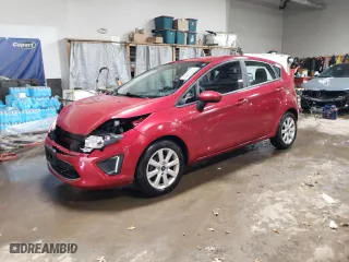 2012 Ford Fiesta SE with VIN 3FADP4EJXCM184537, listed as a Copart auction lot 52155245 with 100,279 mi miles and Salvage Title. Bid and sale history available at carsss.com. Image 1.