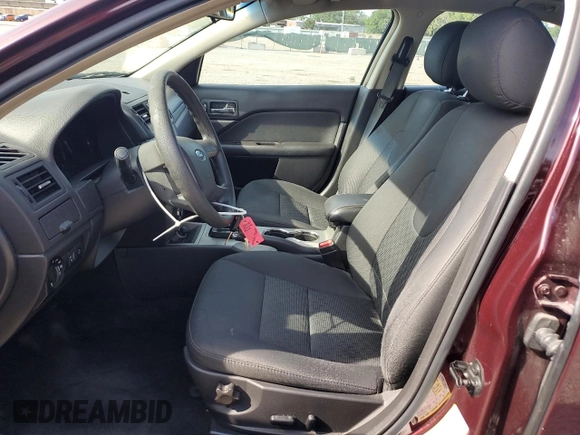2012 Ford Fusion SE with VIN 3FAHP0HA0CR291458, listed as a Copart auction lot 63357165 with 122,992 mi miles and Salvage title. Bid and sale history available at DreamBid. Image 7.