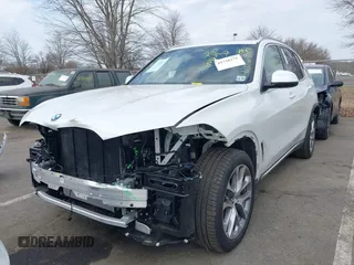 2025 BMW X5 xDrive40i with VIN 5UX23EU06S9W52867, listed as a IAAI auction lot 41726171 with 5,123 mi miles. Bid and sale history available at carsss.com. Image 2.