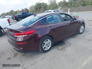 2019 Kia Optima LX with VIN 5XXGT4L36KG284965, listed as a IAAI auction lot 40374239 with 64,351 mi miles. Bid and sale history available at carsss.com. Image 4.