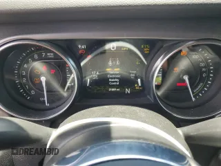 2023 Jeep Wrangler Rubicon z VIN 1C4JJXR65PW557849, wystawiony jako Copart lot #57845705 z przebiegiem 21 849 mil mil oraz Szkoda całkowita • Salvage title. Historia ofert i sprzedaży dostępna na DreamBid. Obrazek 9.